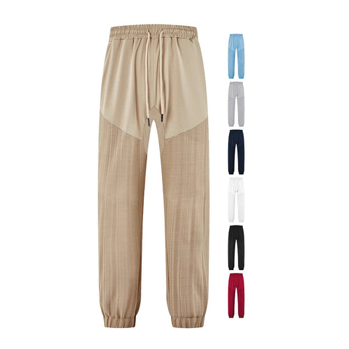 Men's slim-fit jogging pants with elastic drawstring waistband and textured knee panel StylebySassy