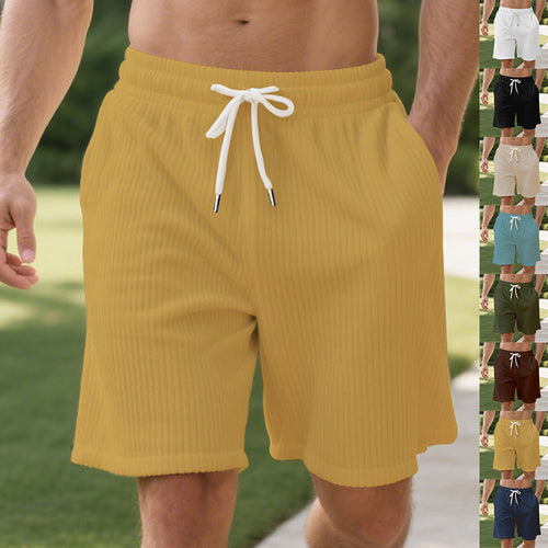 Men's ribbed jersey shorts with elastic waistband, decorative drawstring, and side slant pockets StylebySassy