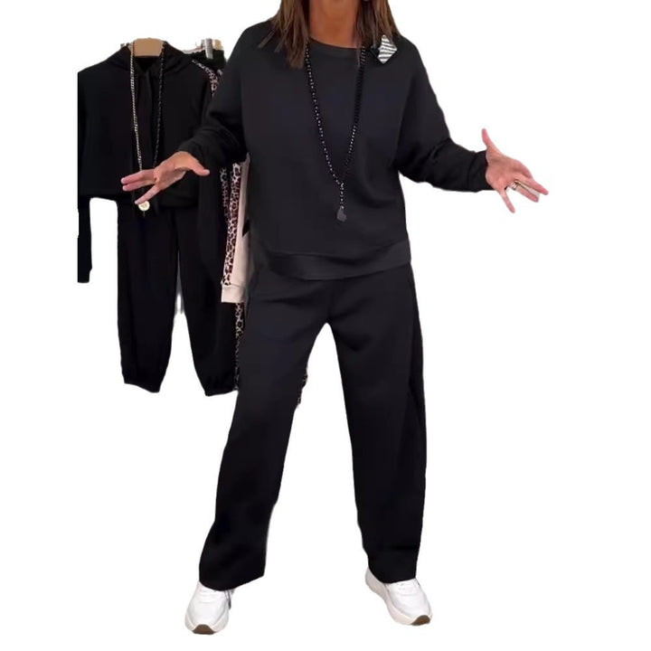 Women’s oversized jogging set with boxy sweatshirt and wide palazzo pants with decorative side stripe StylebySassy