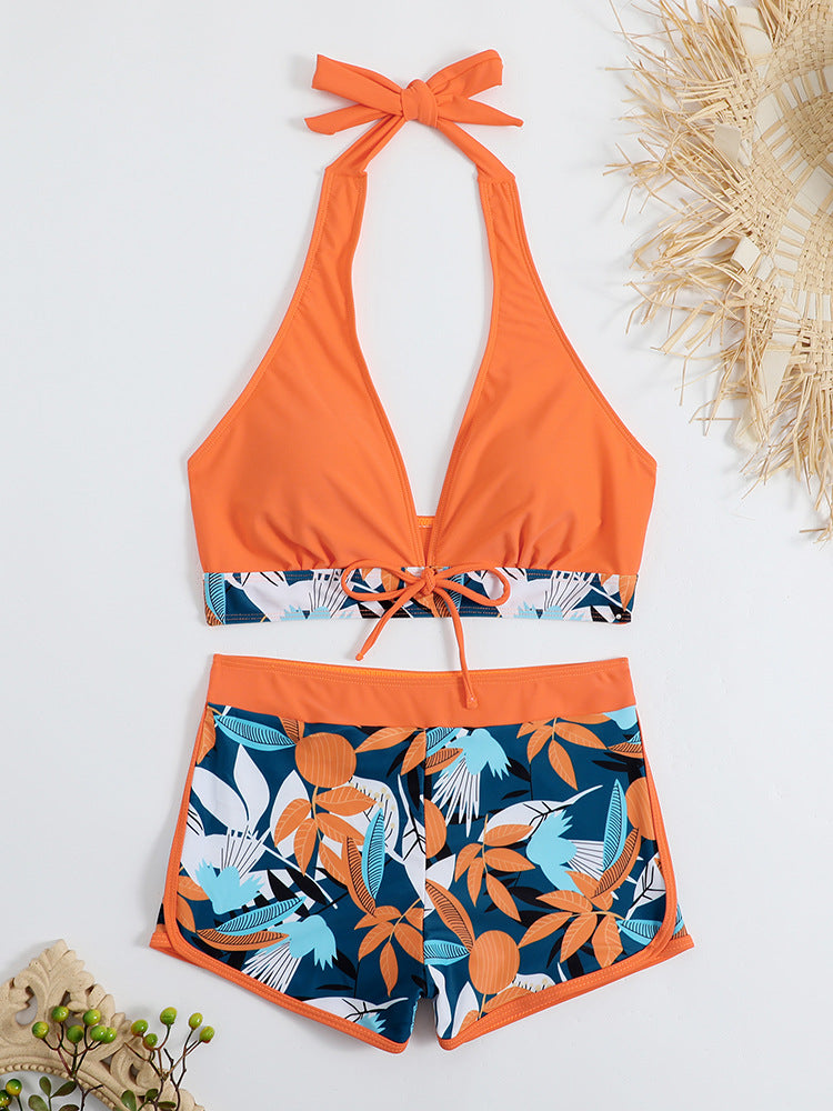 Women's sporty bikini set with adjustable halter top and shorts StylebySassy