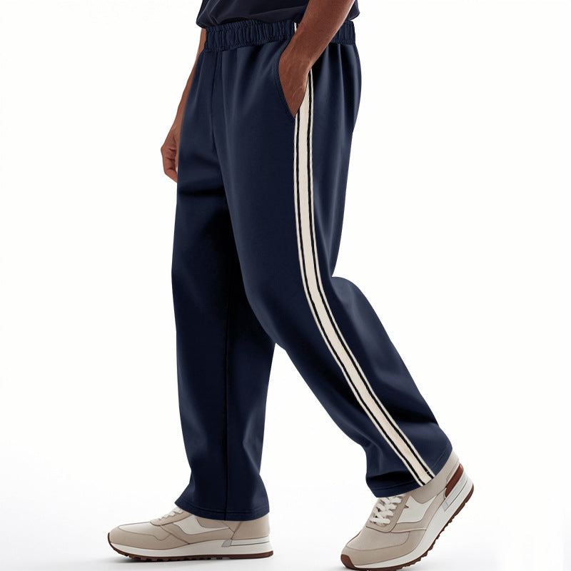 Men's loose Relax track pants in retro style with double side piping and elastic comfort waistband StylebySassy