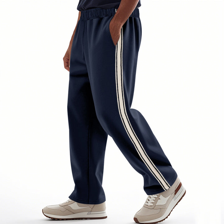 Men's loose Relax track pants in retro style with double side piping and elastic comfort waistband StylebySassy