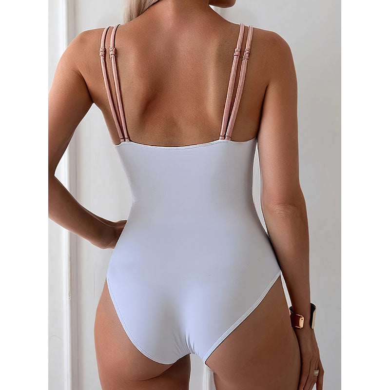 Women's one-piece swimsuit with decorative shell details StylebySassy