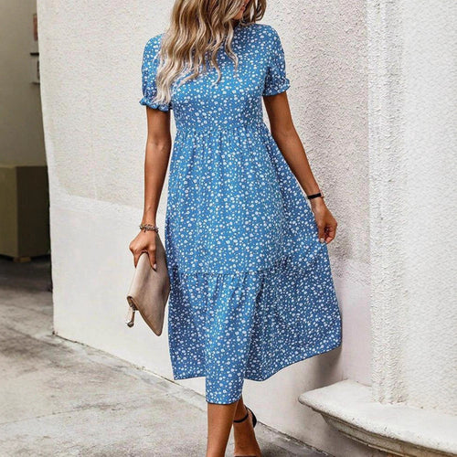 Women's airy midi dress with all-over floral pattern, gathered waist seam and short puff sleeves StylebySassy