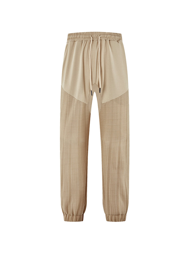 Men's slim-fit jogging pants with elastic drawstring waistband and textured knee panel StylebySassy