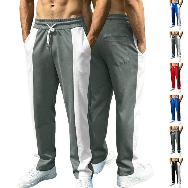 Men's sporty jogging pants with contrasting side inserts, elastic waistband, drawstring, and side pockets StylebySassy