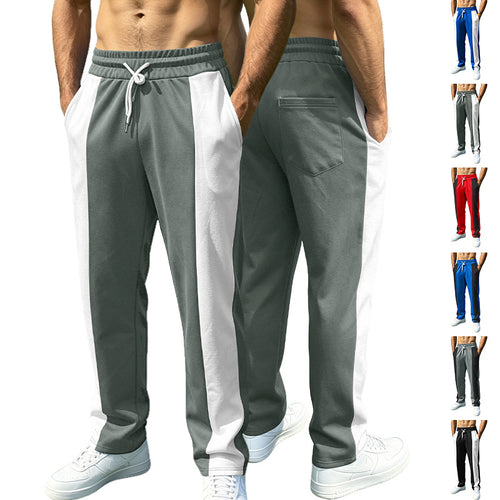 Men's sporty jogging pants with contrasting side inserts, elastic waistband, drawstring, and side pockets StylebySassy