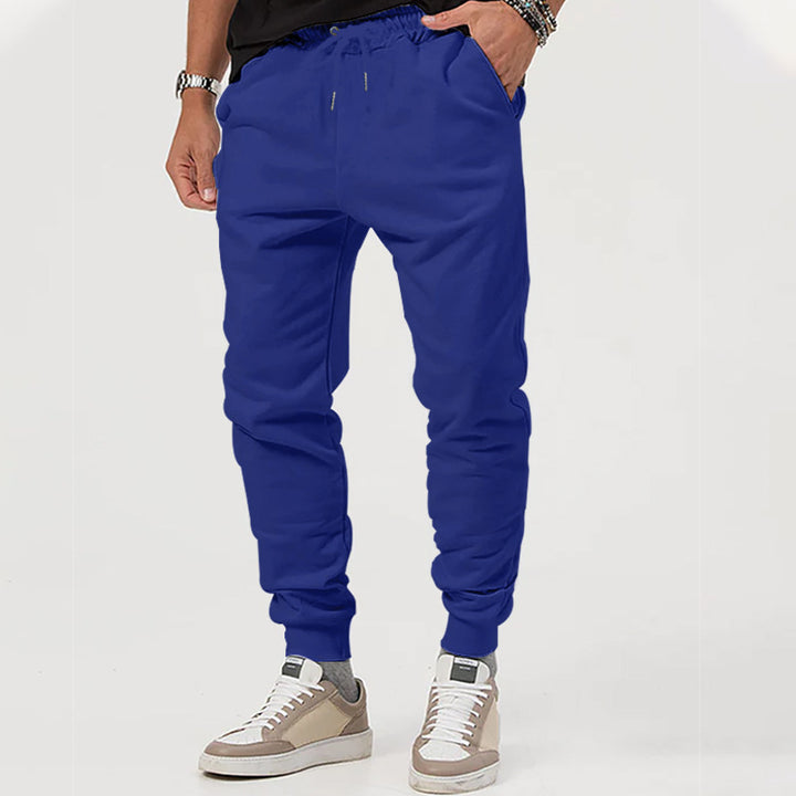 Men's jersey sweatpants in a tapered cut with concealed drawstring and shape-stable ankle cuffs StylebySassy