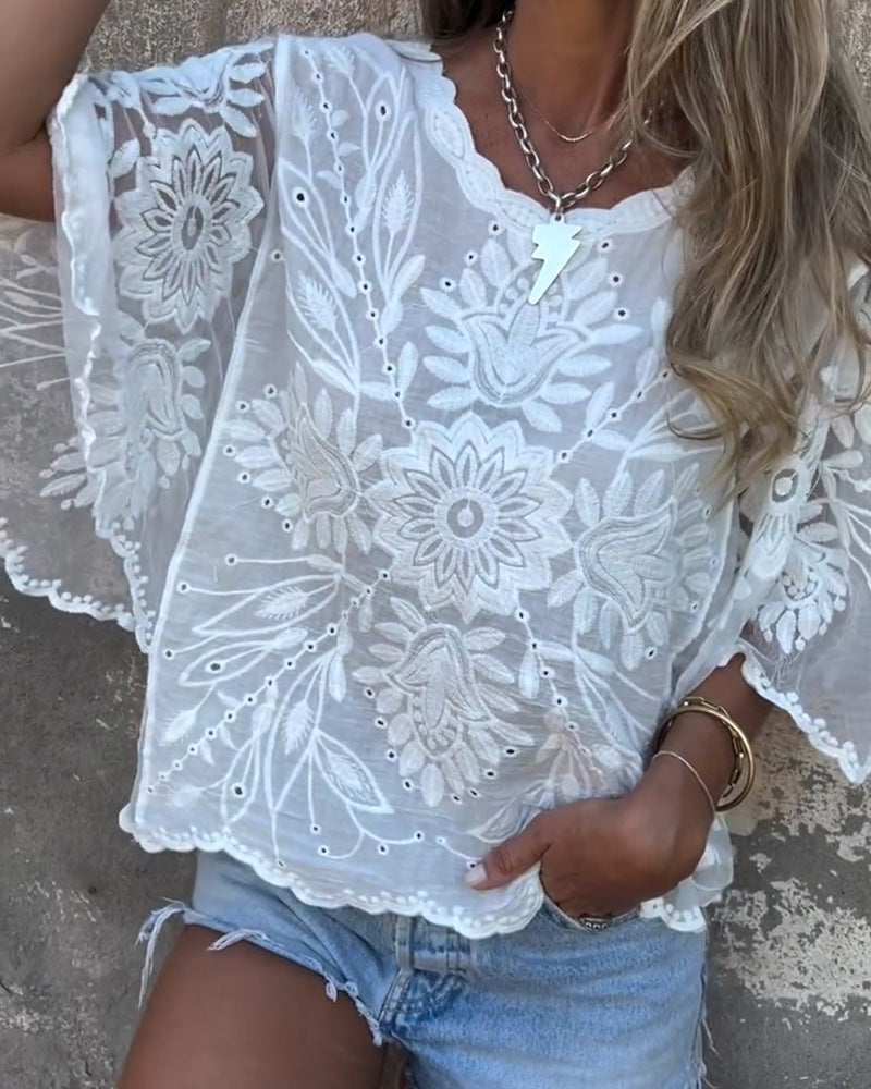 Women's embroidered tunic with ajour embroidery, wavy hem and wide batwing sleeves StylebySassy