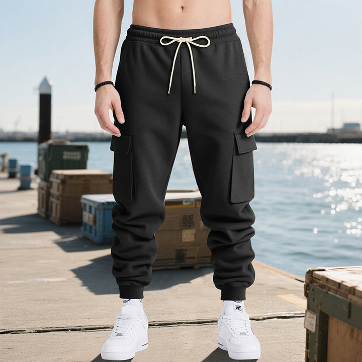 Men's nan multifunctional powerful jogging pants with generous flap pockets, elastic drawstring, and tapered leg ending StylebySassy