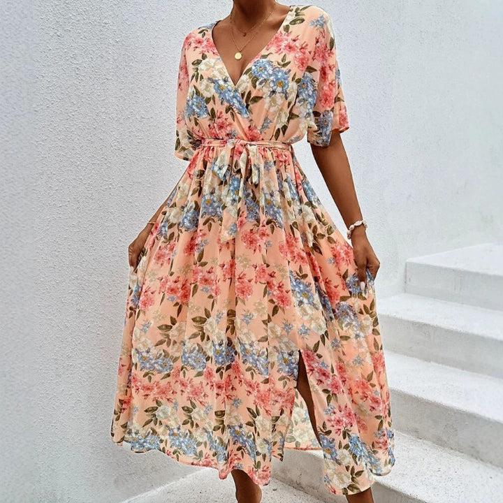 Women's floral V-neck tie dress with fitted belt and side leg slit StylebySassy