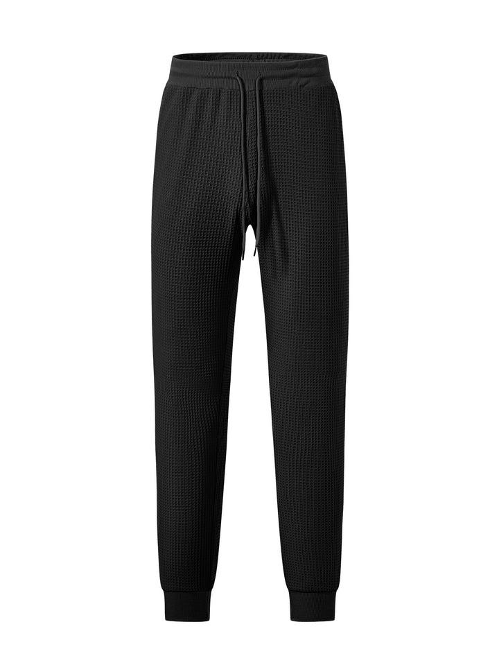Men's fine-structured jersey lounge pants tapered cut with drawstring waistband and ribbed leg openings StylebySassy
