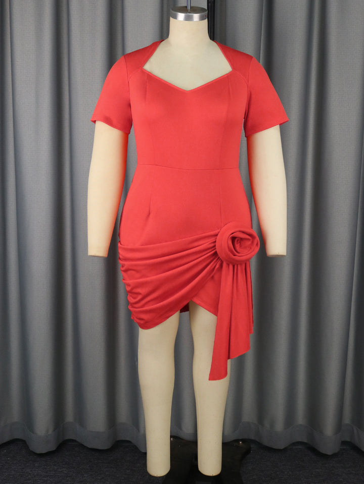 Women's fitted dress with asymmetrical draping detail StylebySassy
