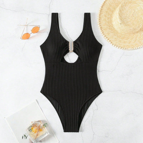 Women's One-Piece Swimsuit with Modern Cut-Out Design and Textured Fabric StylebySassy