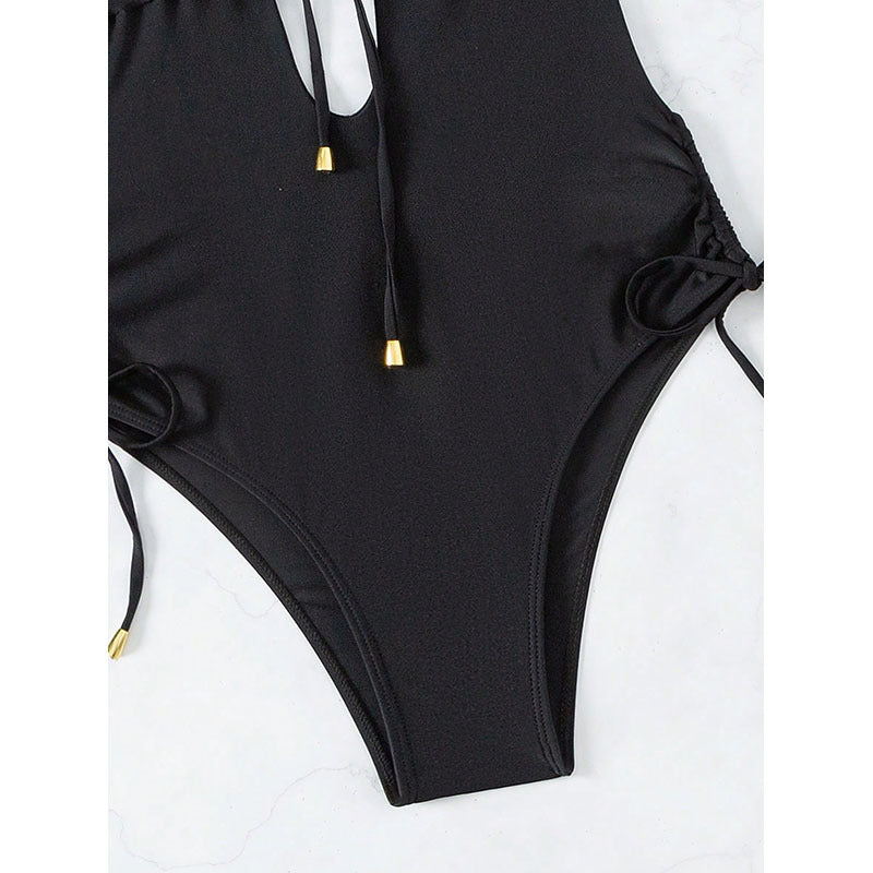 Women's one-piece swimsuit with deep V-neckline and lace-up detail StylebySassy