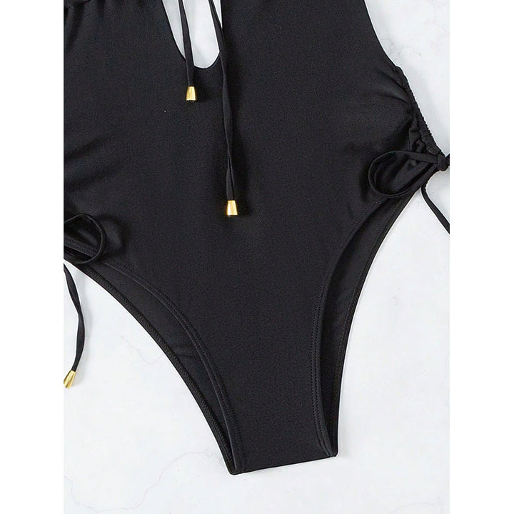 Women's one-piece swimsuit with deep V-neckline and lace-up detail StylebySassy