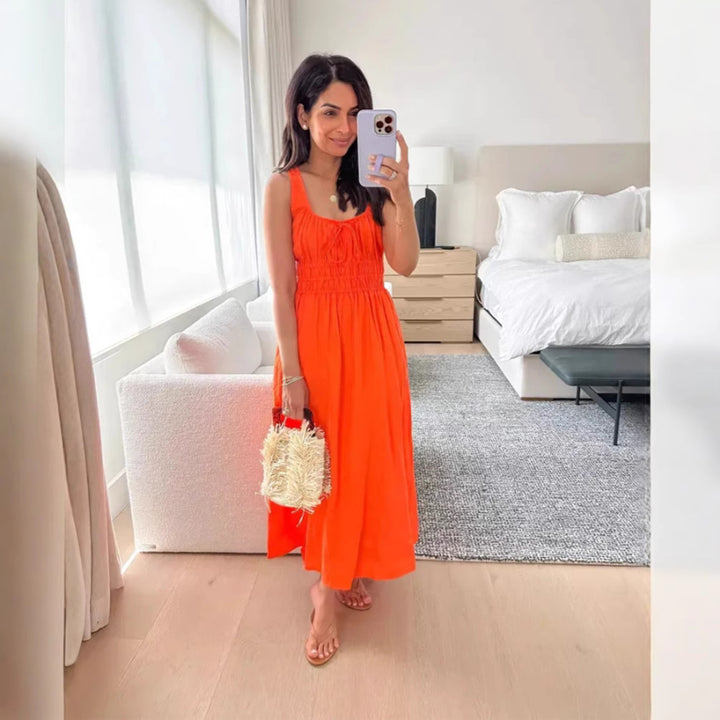 Women's knee-length linen look dress with smocked bodice, elastic waistband and wide straps StylebySassy