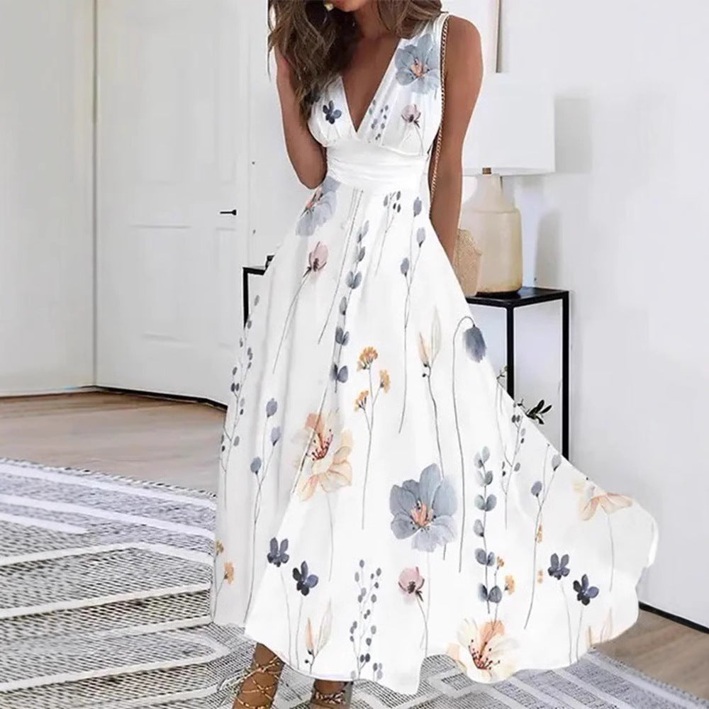 Women's flared midi dress with deep V-neck, empire waist and delicate floral print StylebySassy