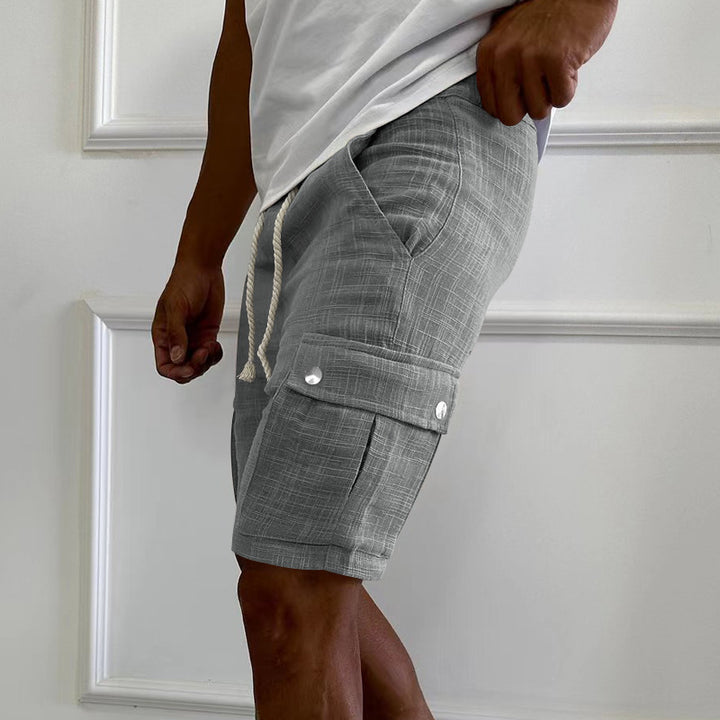 Men's urban cargo Bermuda shorts made of linen-cotton blend with elastic drawstring waistband and snap-flap pockets StylebySassy