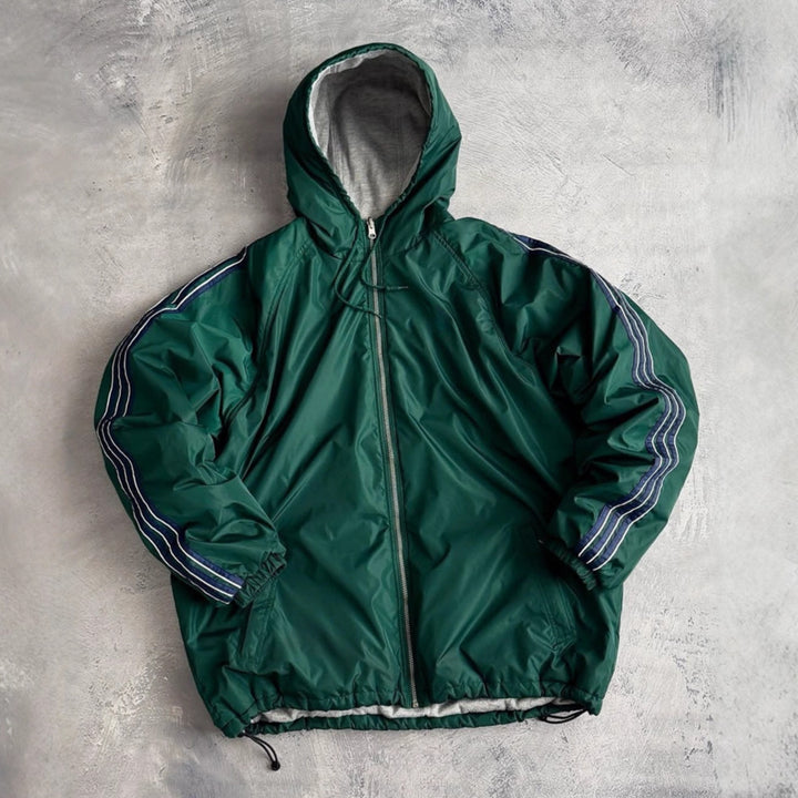 Unisex non-fitted windbreaker with hood padded fleece lining drawstring hem and decorative stripes on sleeves StylebySassy