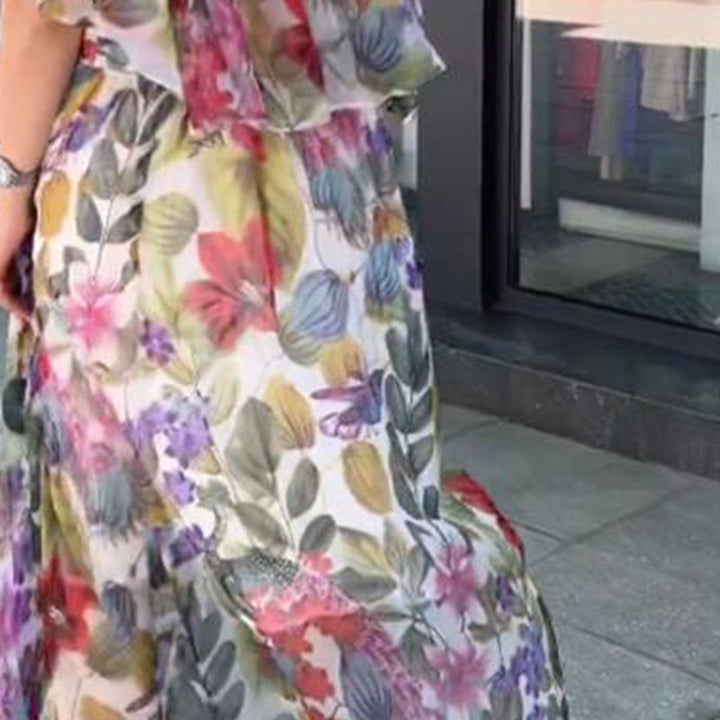 Women’s airy chiffon maxi dress with floral print, gathered round neckline and elastic waistband StylebySassy