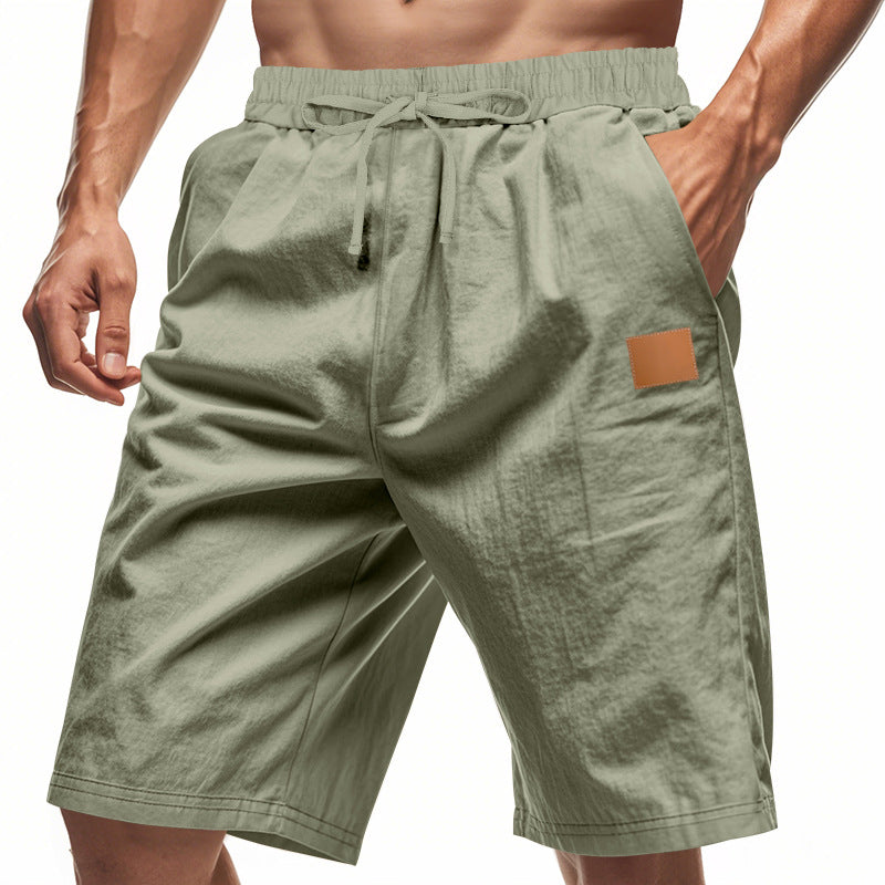 Men's lightweight casual Bermuda shorts with elastic waistband, drawstring and discreet leather application StylebySassy