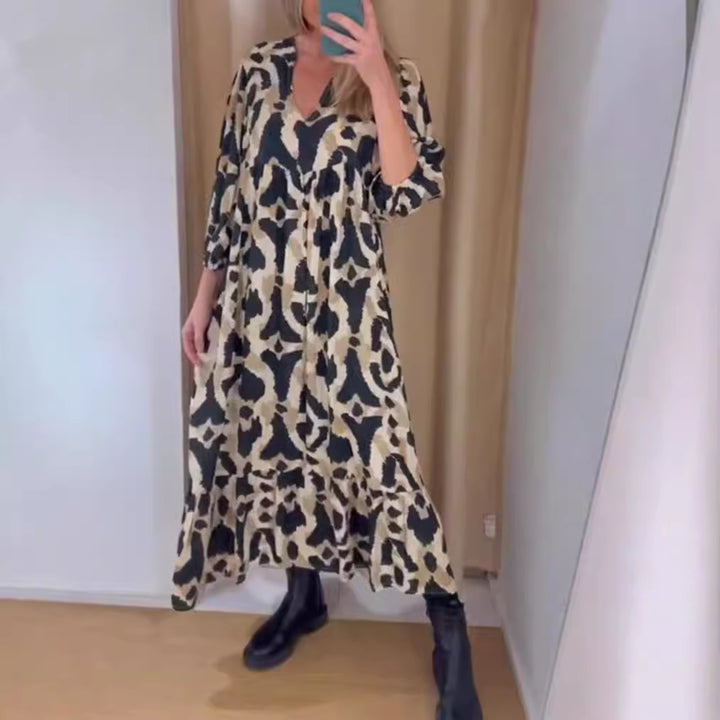 Women's flowing tiered maxi dress with V-neck, gathered bust panel and three-quarter sleeves StylebySassy