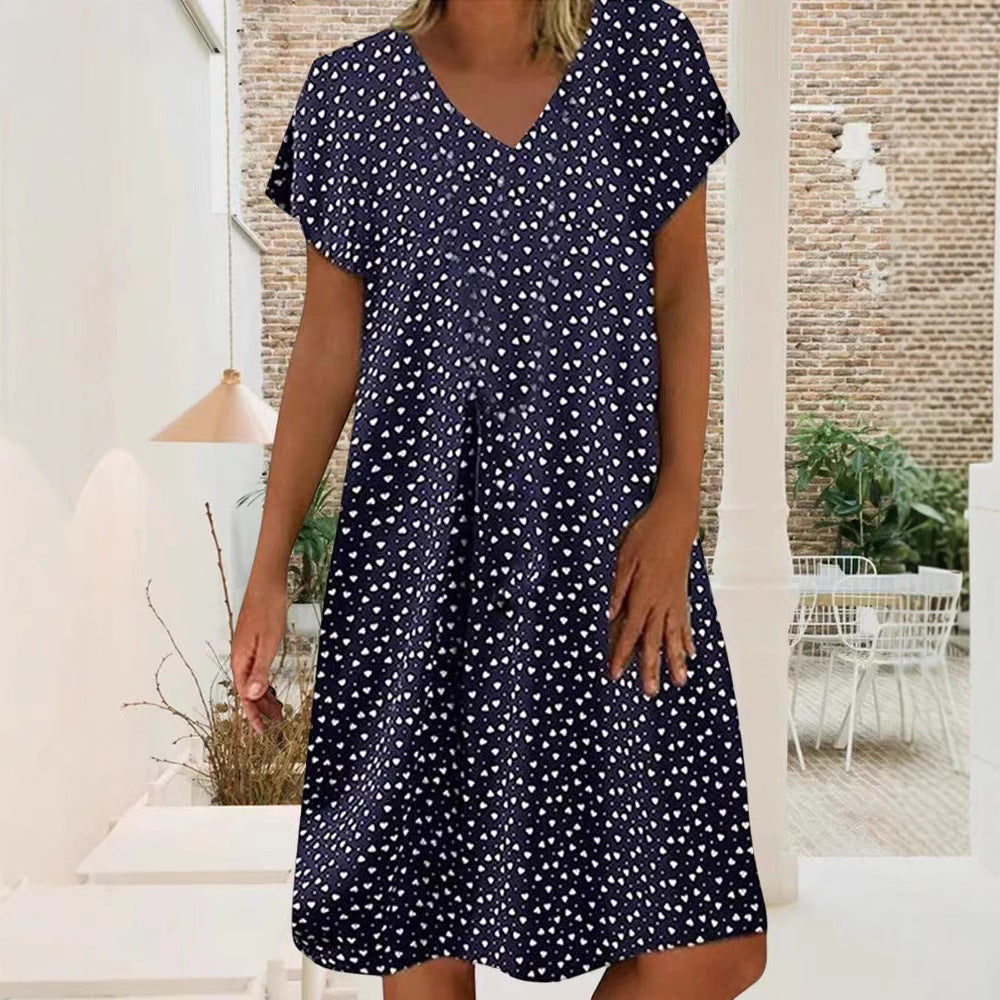 Ladies nan locker falling V-neck short dress with A-line cut, cap sleeves and all-over heart print StylebySassy