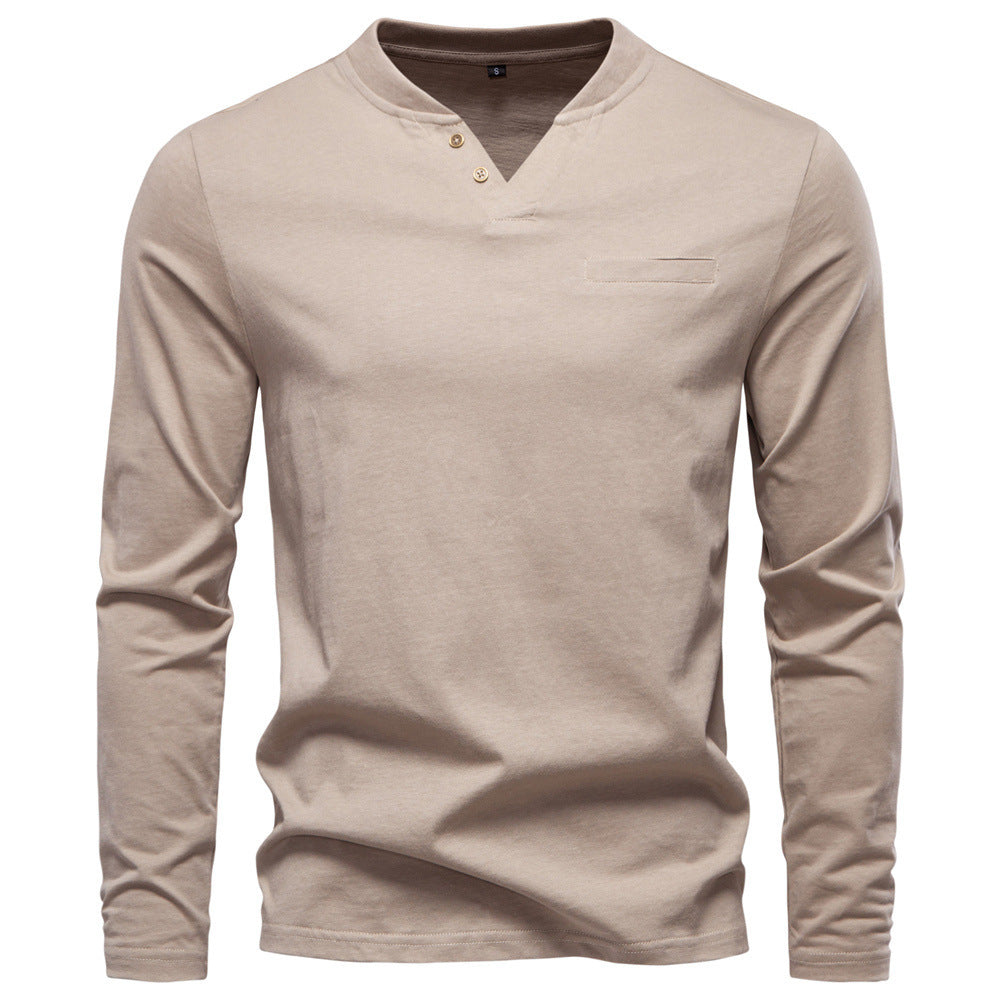 Men's tailored long sleeve shirt in Henley style with short V-neck, decorative buttons, and chest pocket StylebySassy