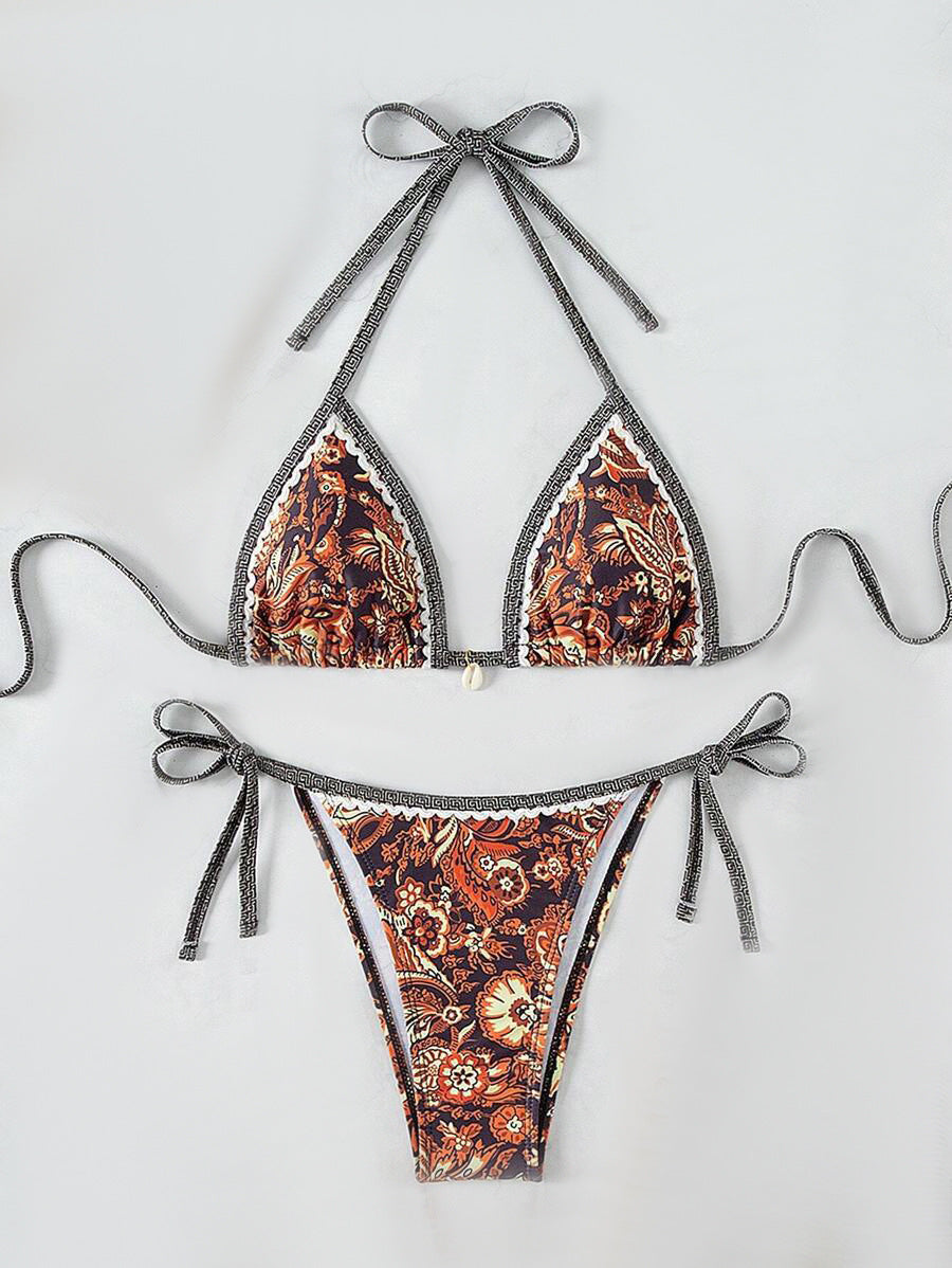 Women's triangle bikini set with adjustable tie straps and floral design StylebySassy