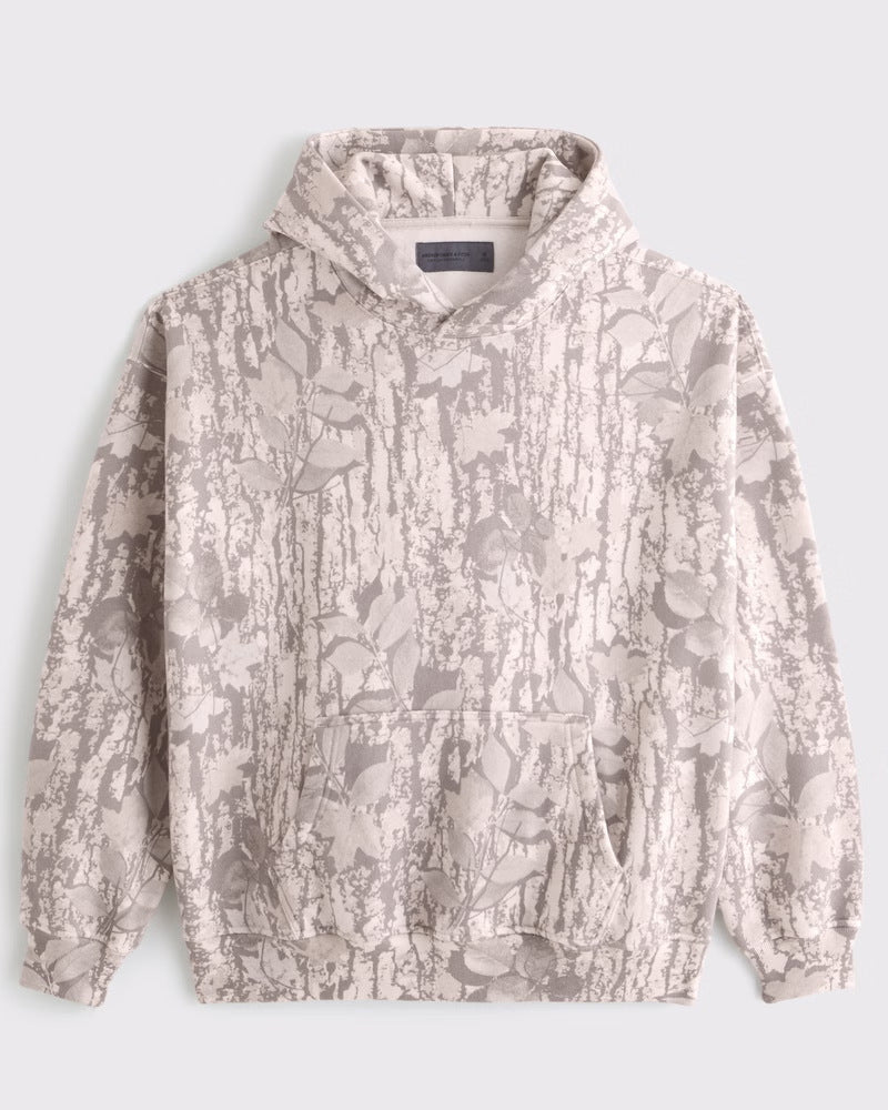 Unisex loose-fit hoodie sweatshirt with subtle leaf texture, double hood without drawstring and kangaroo pocket StylebySassy