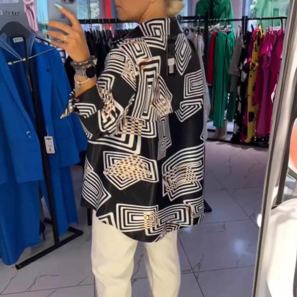 Women’s loose silk-look blouse with graphic square print, asymmetrical hem and mother-of-pearl button placket StylebySassy