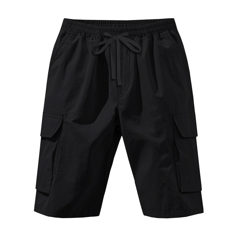 Men's knee-length utility shorts made of lightweight cotton blend with elastic drawstring waistband and patch flap pockets StylebySassy