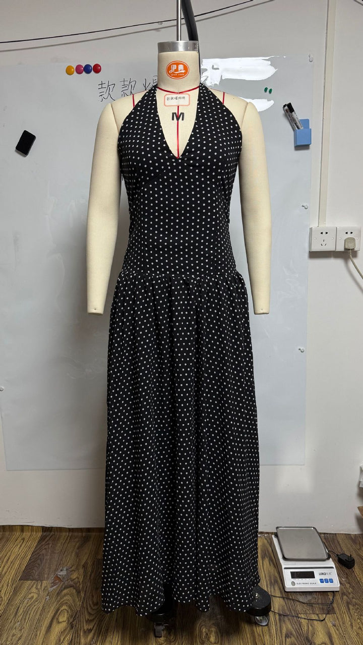 Ladies long halter dress with deep V-neck, tailored empire seam and flared layered skirt StylebySassy