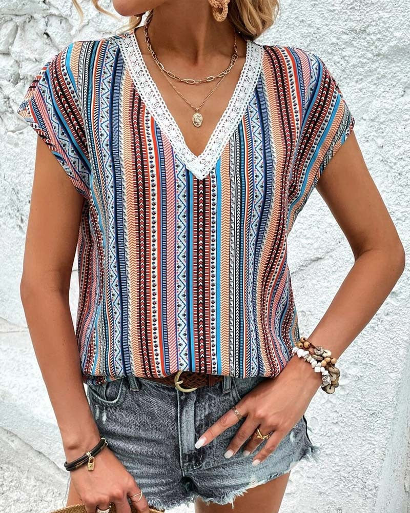 Women's light V-neck top with ethnic stripe pattern and crochet trim StylebySassy