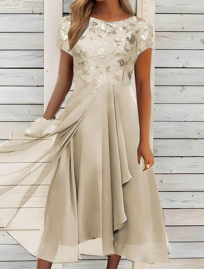 Women's elegant chiffon midi dress with floral lace appliqué and flowing A-line skirt StylebySassy