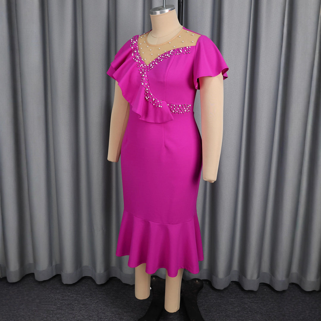 Women's figure-hugging dress with ruffle design and rhinestone accents StylebySassy