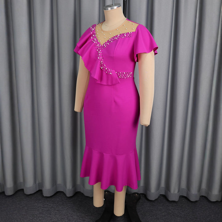 Women's figure-hugging dress with ruffle design and rhinestone accents StylebySassy