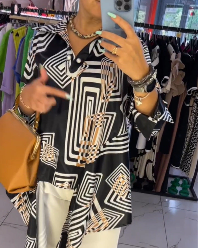 Women’s loose silk-look blouse with graphic square print, asymmetrical hem and mother-of-pearl button placket StylebySassy