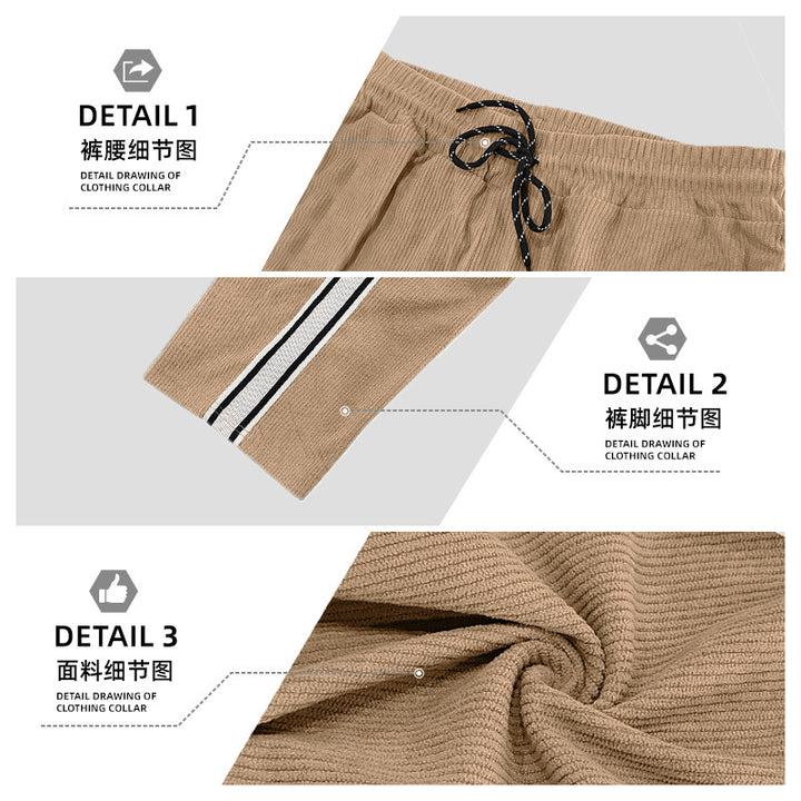 Men's loose training pants in corduroy look with drawstring waistband and side contrast stripes StylebySassy