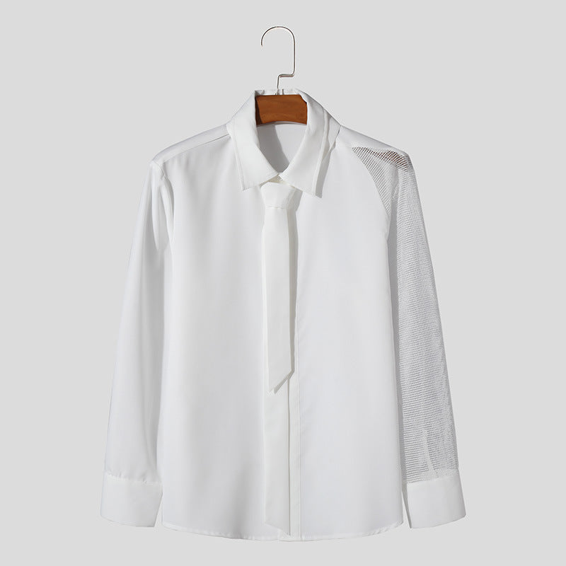 Women’s flowing blouse with attached bow, concealed button placket, and one-sided mesh sleeve detail StylebySassy