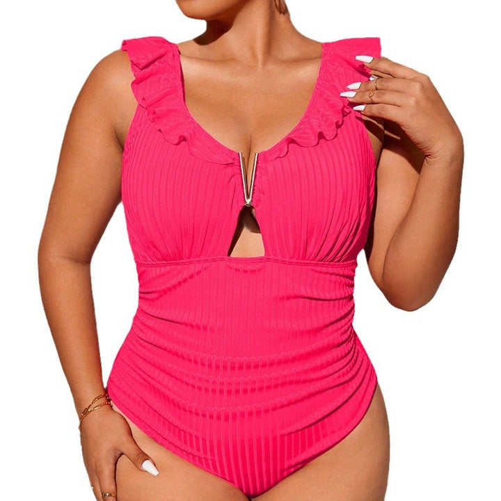 Women's one-piece swimsuit with decorative ruffle details and modern cut-out design