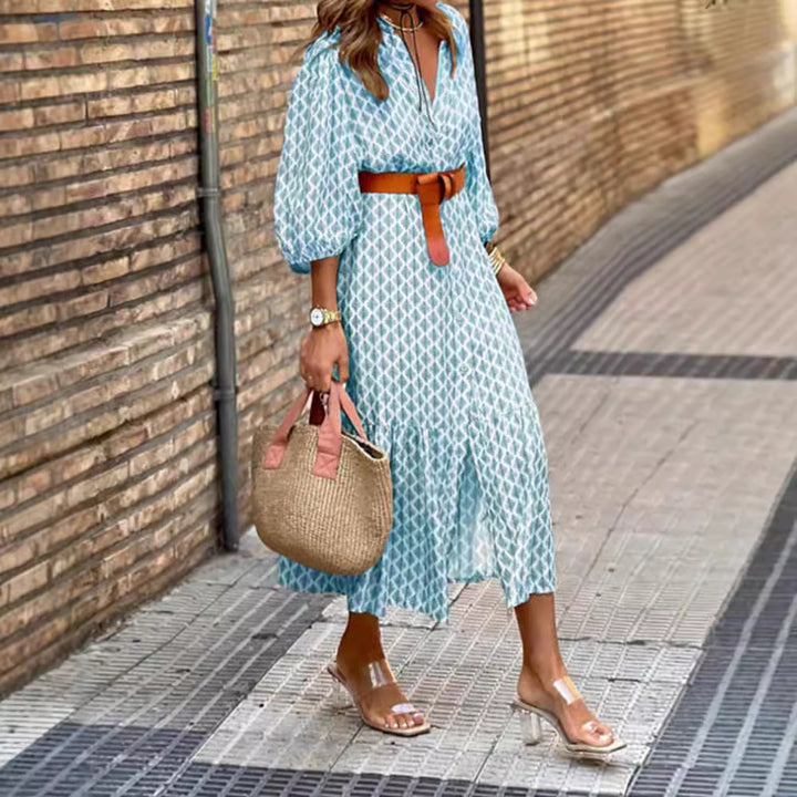 Women's lightweight patterned midi dress with V-neck, button placket, tiered skirt, and balloon sleeves StylebySassy