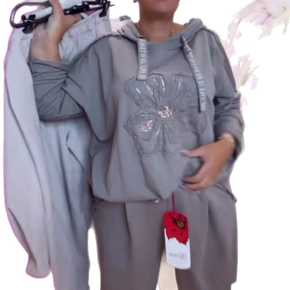 Women's relaxed lounge set with floral sequin hoodie, drawstring and wide pleated pants StylebySassy
