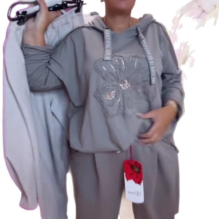 Women's relaxed lounge set with floral sequin hoodie, drawstring and wide pleated pants StylebySassy