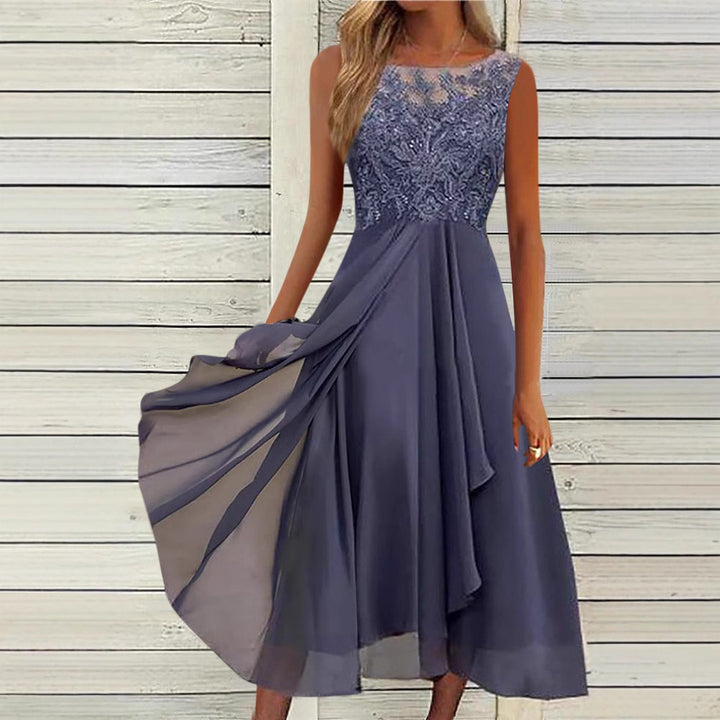 Women's sleeveless chiffon midi dress with embroidered illusion lace, boat neckline, and multilayer flared skirt StylebySassy