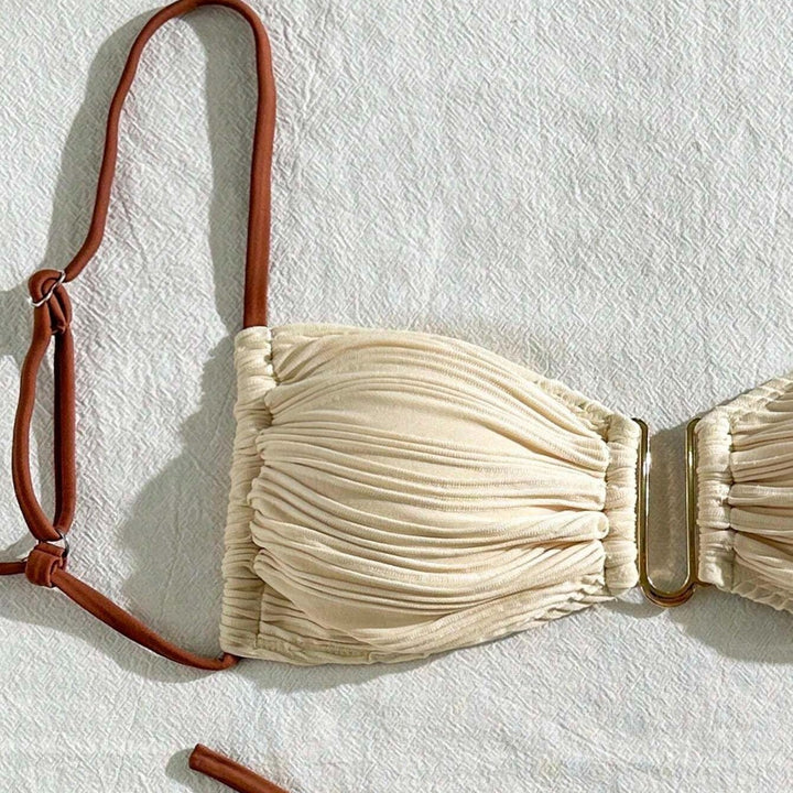Women's triangle bikini with elegant gathering design and trendy strap details StylebySassy