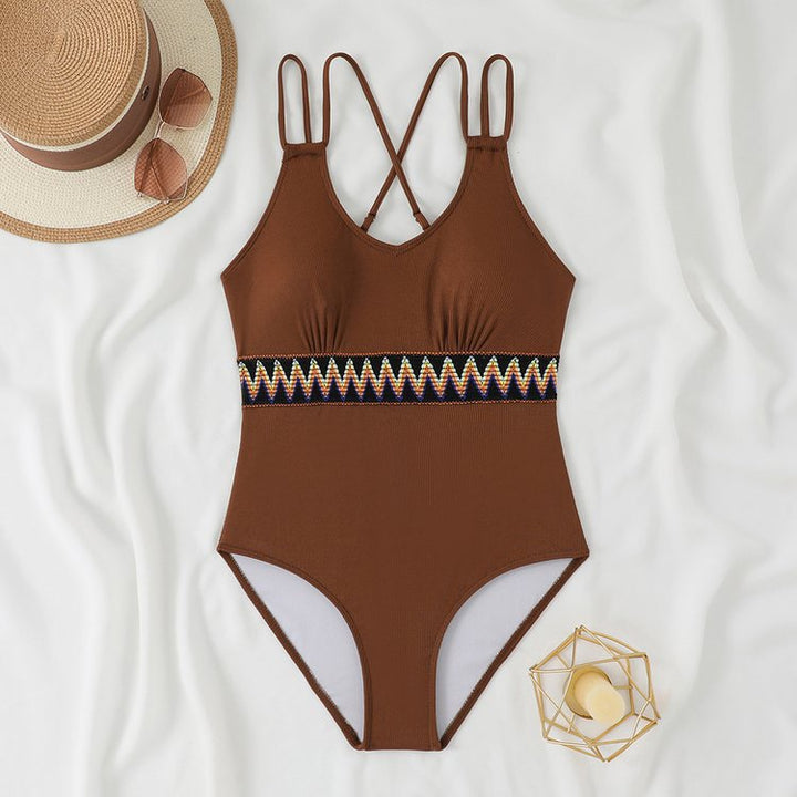 Women's One-Piece Swimsuit with Stylish Back Cutout and Decorative Cuff StylebySassy