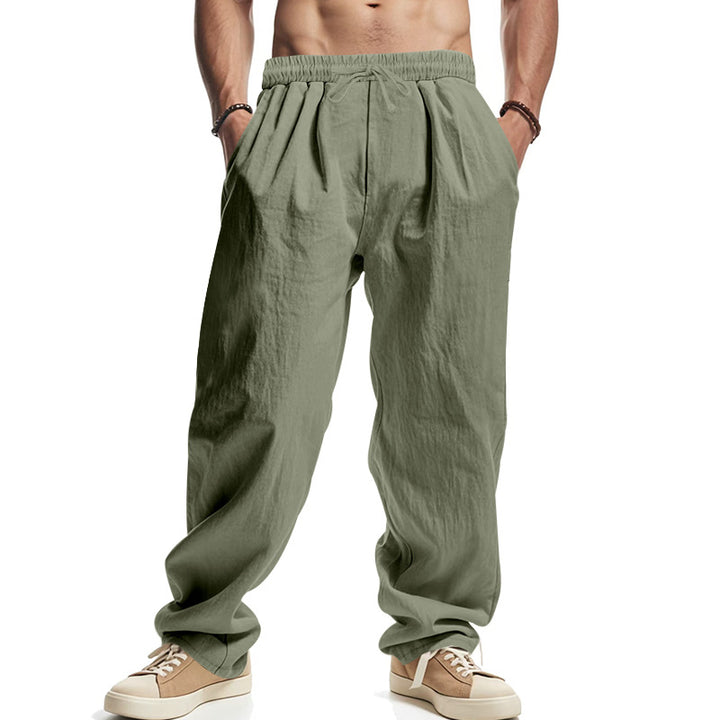 Men's loose leisure pants with elastic waistband, drawstring, and deep side pockets StylebySassy