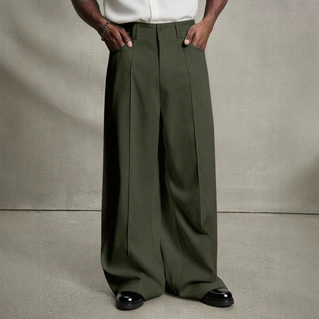 Men's wide pleated pants with high waistband, precise creases, and side inset pockets StylebySassy